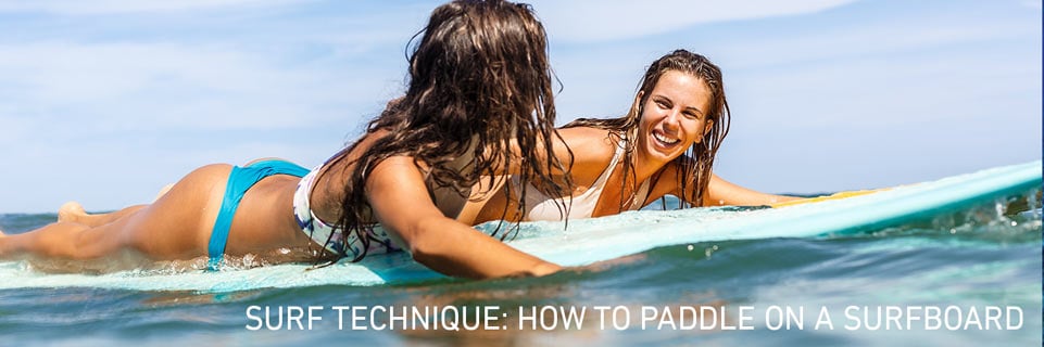 how to paddle on a surfboard